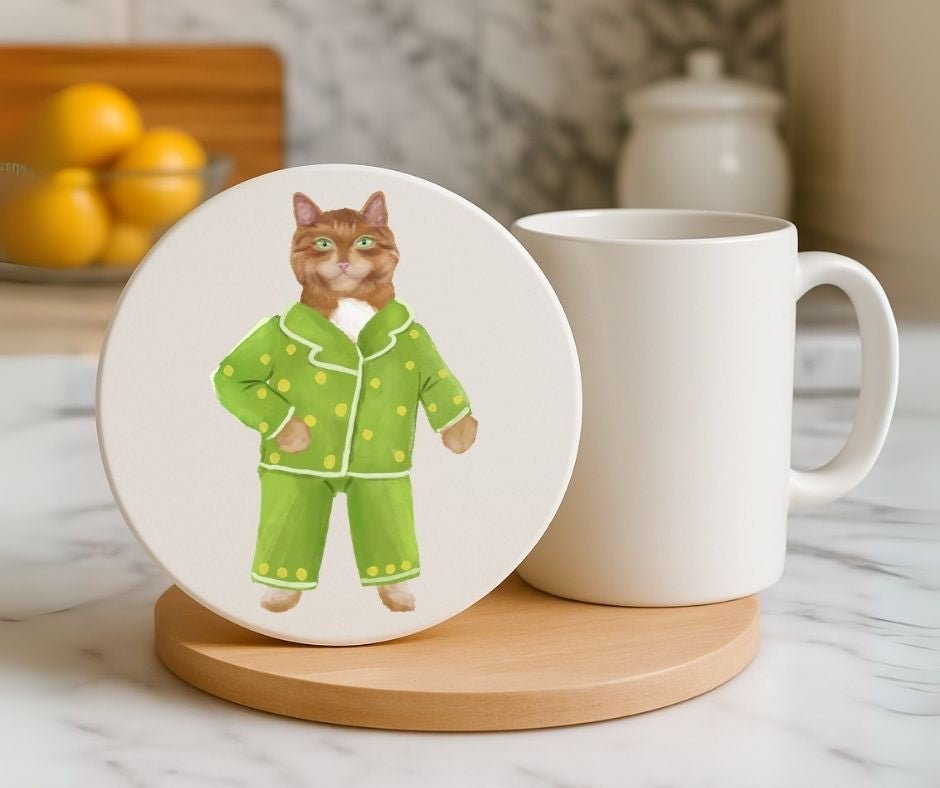 Ginger Cat in Green Pajamas Ceramic Coaster - MerikaArt