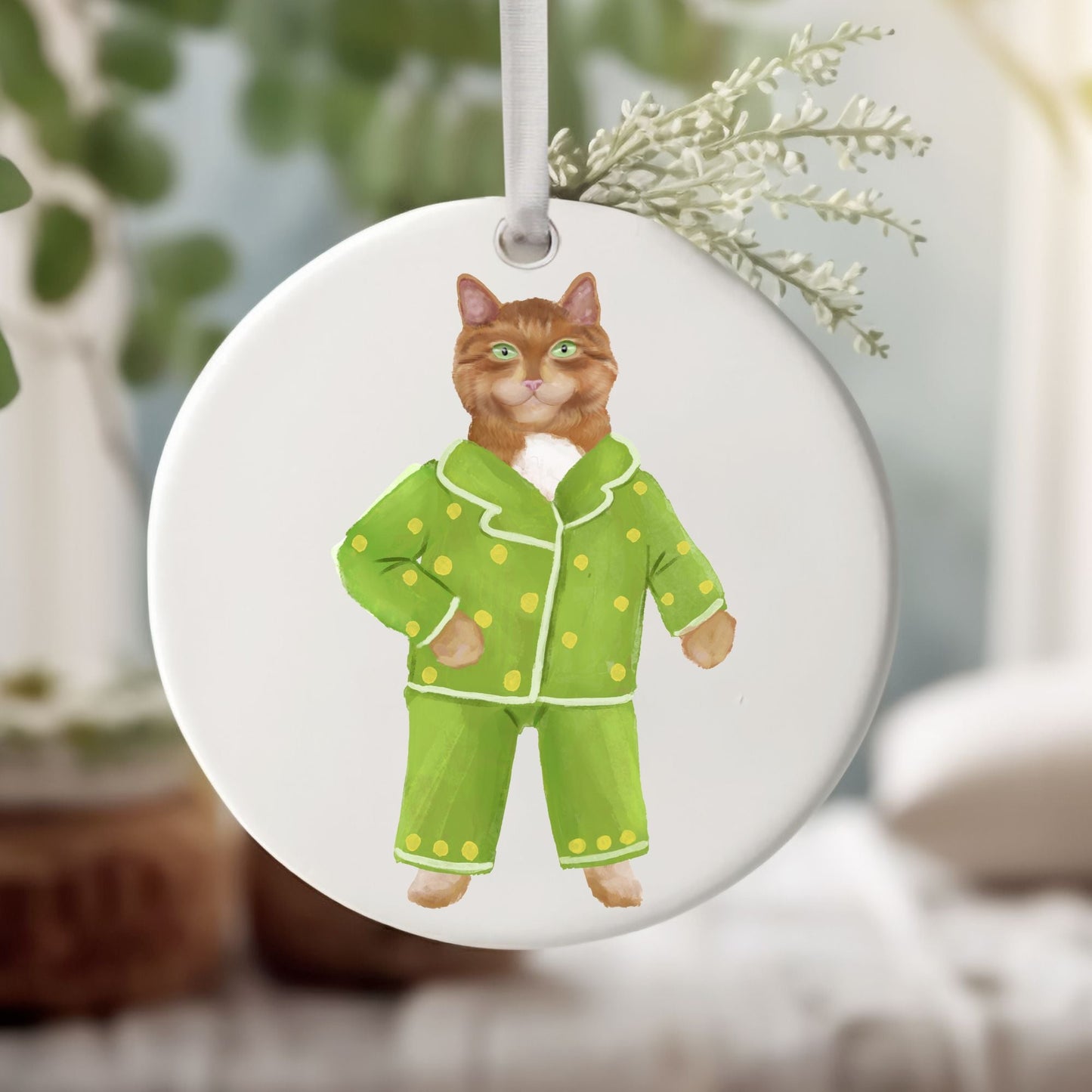 Ginger Cat in Green Pajamas Ceramic Ornament - MerikaArt
