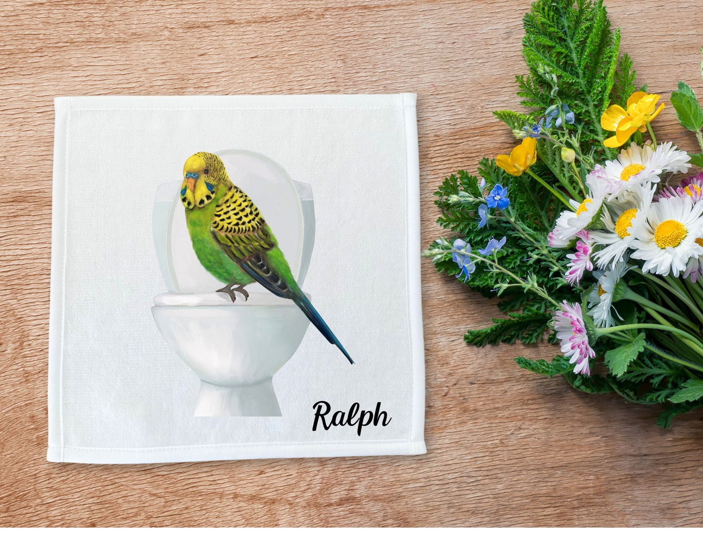 Playful Budgie on Toilet Washcloth – A Quirky Bird Lover's Gift - MerikaArt