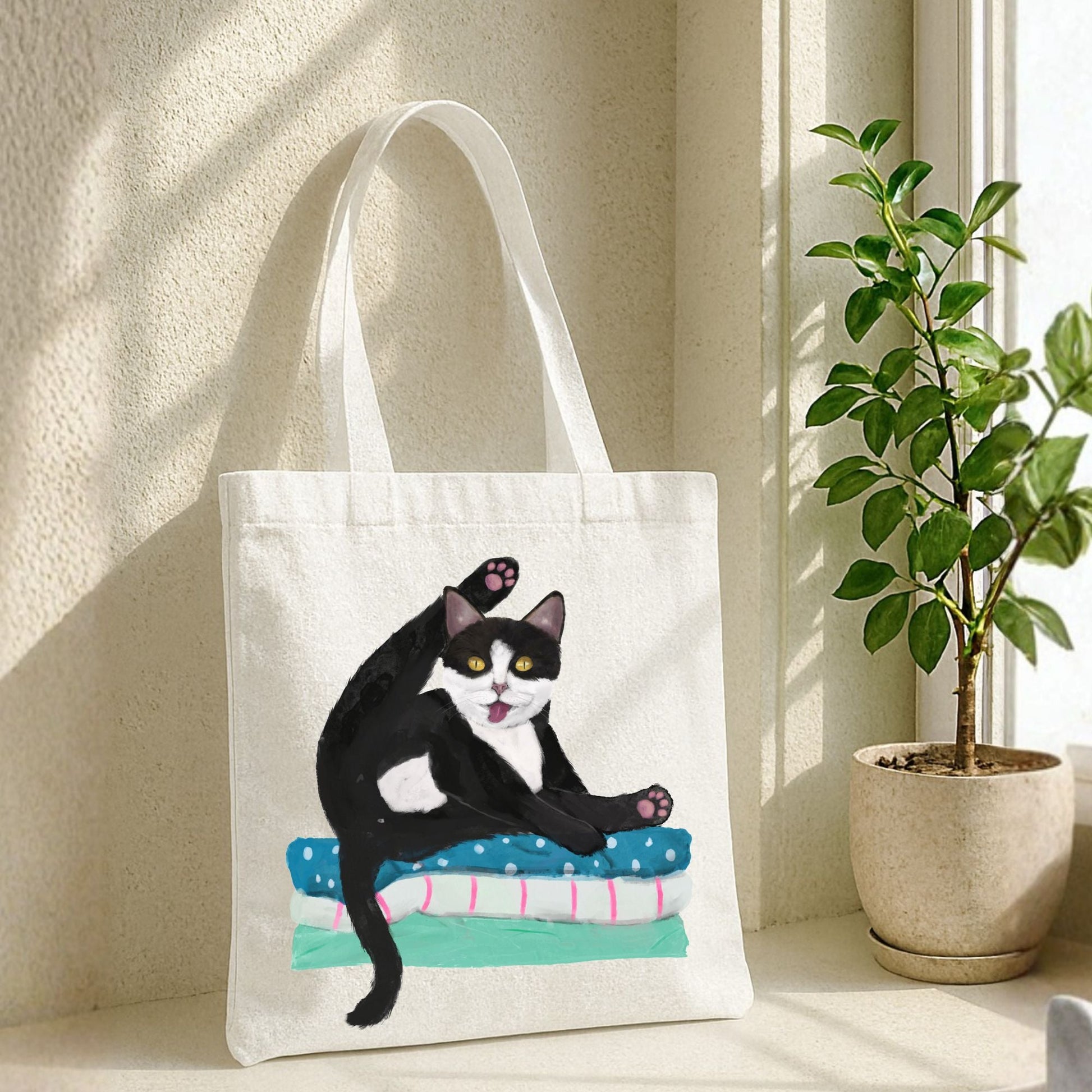 Tuxedo Cat Grooming on Blankets Canvas Tote Bag - MerikaArt