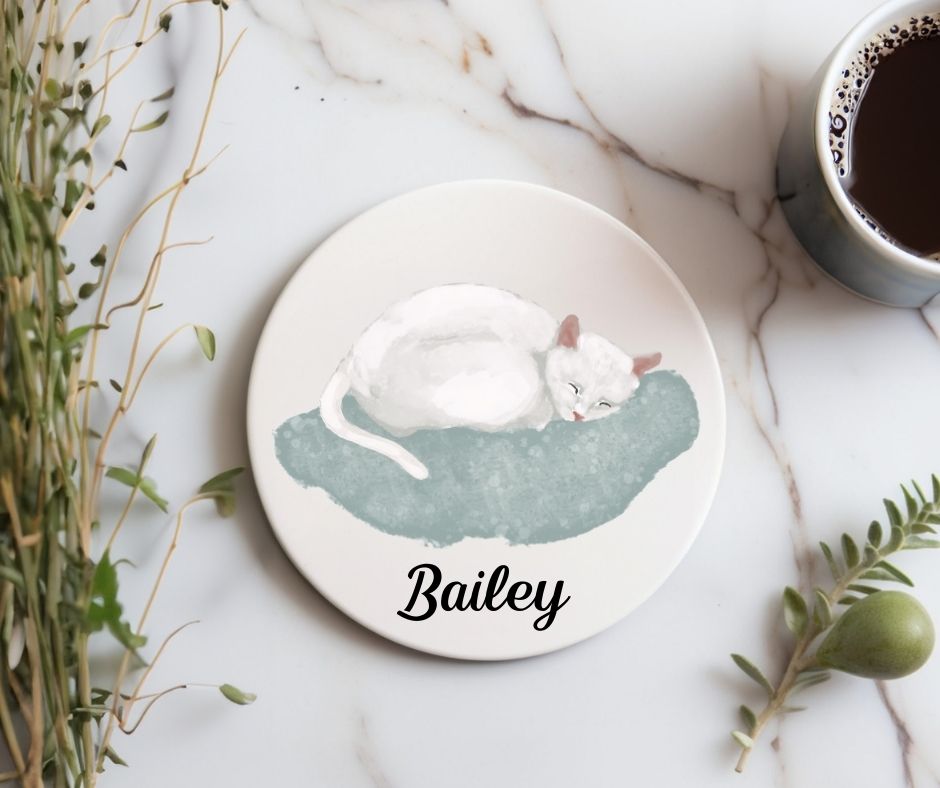 White Cat Sleeping on Cushion Ceramic Coaster - MerikaArt