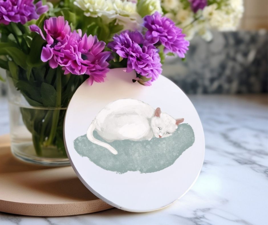 White Cat Sleeping on Cushion Ceramic Coaster - MerikaArt