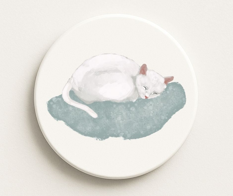 White Cat Sleeping on Cushion Ceramic Coaster - MerikaArt