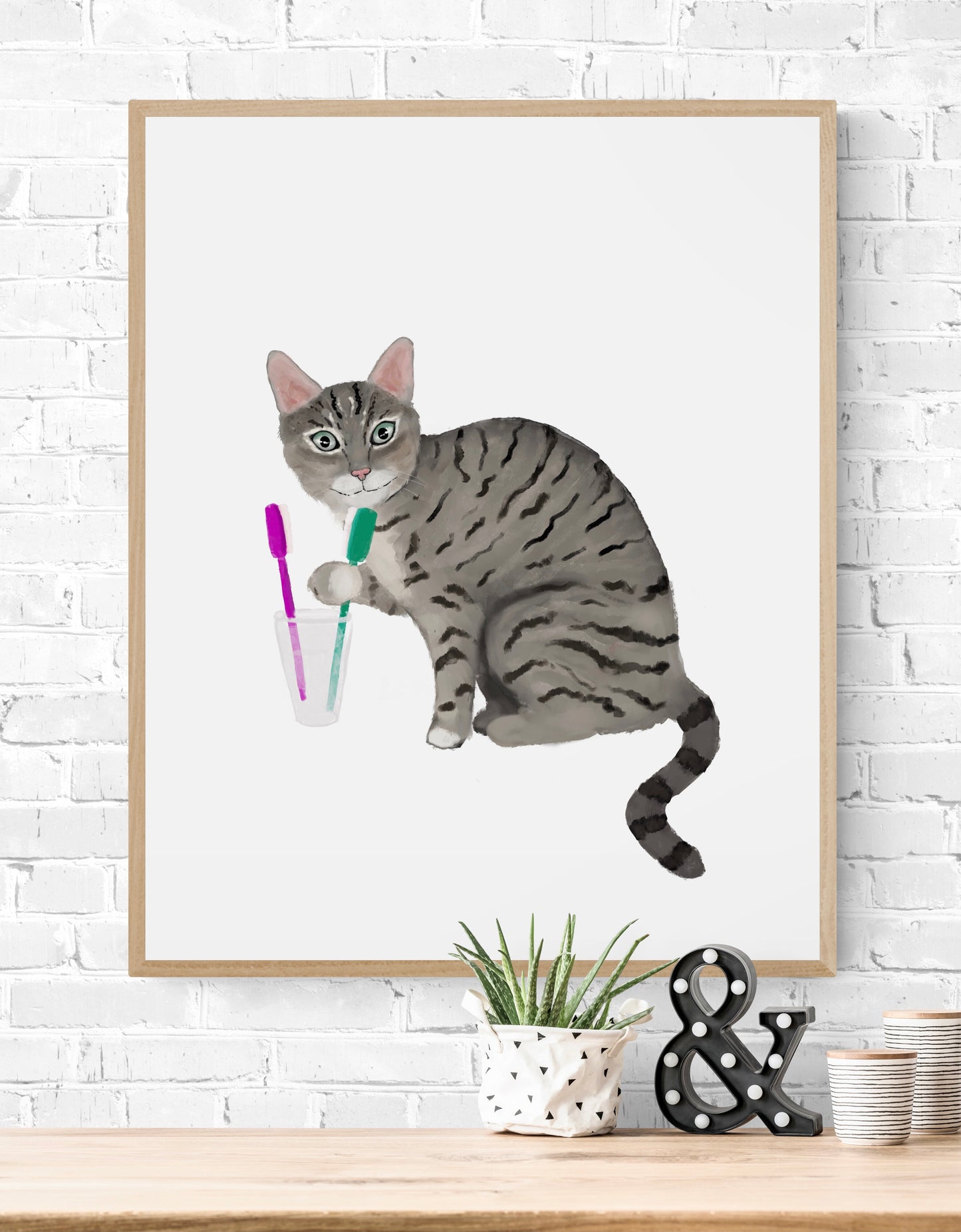 Gray Tabby Cat Licking Toothbrush